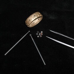 Golden band ring with diamonds