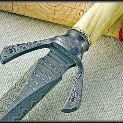 Hyperborian Damascus Dagger with Narwahl Tusk Damascu guard close up