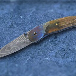 Ocean Ripple Folder in Damascus and mammoth ivory