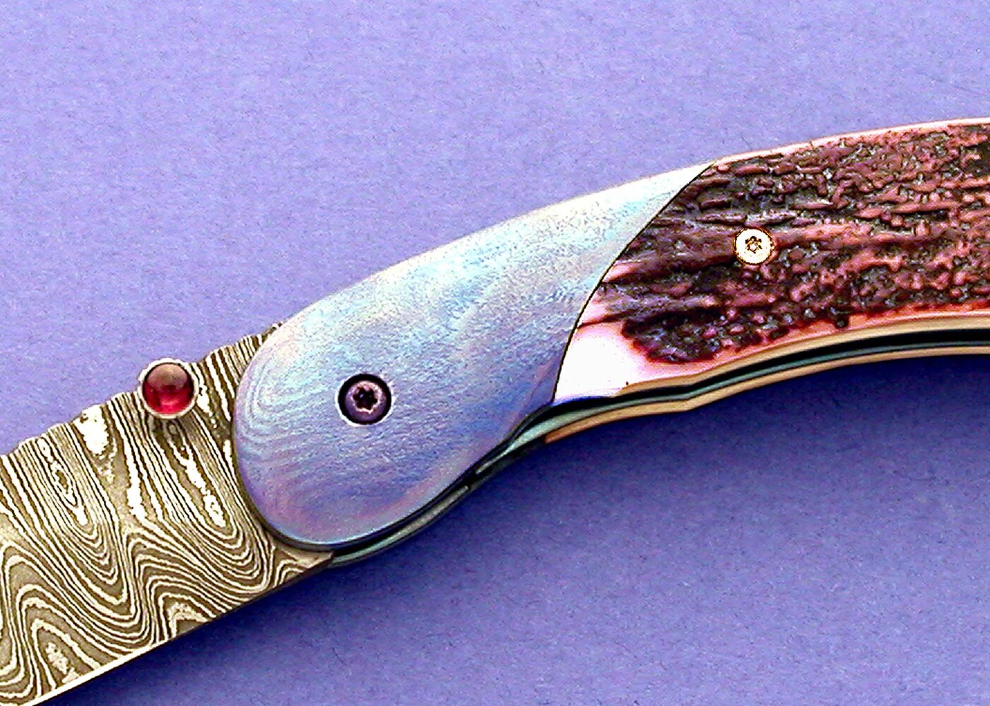 Carbon Damascus and Timascus and Ivory Folder close up